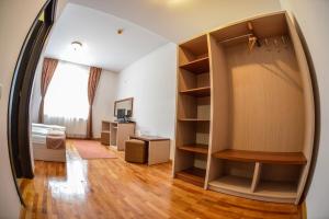 TV a/nebo společenská místnost v ubytování Hotel Posada