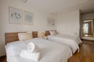 Un pat sau paturi într-o cameră la TT Holidays- Hay Riad +37 fotografii