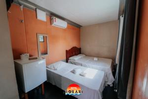 Postel nebo postele na pokoji v ubytování Pousada de Containers