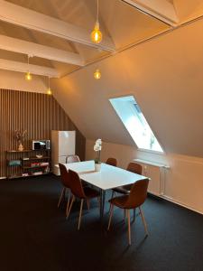 Kuchyň nebo kuchyňský kout v ubytování VISIONHOUSE Hotel