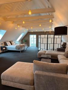 Posezení v ubytování VISIONHOUSE Hotel