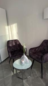 Ein Sitzbereich in der Unterkunft Luxus-Flat Wohnung-Hanau/Frankfurt