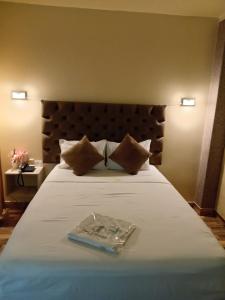 Hotel Jose Ignacio Chepen客房内的一张或多张床位