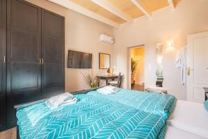 Ένα ή περισσότερα κρεβάτια σε δωμάτιο στο Finca Sun Club Home +17 φωτογραφίες