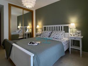 Postel nebo postele na pokoji v ubytování MANZANA bonito y cómodo apartamento con piscina