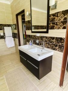 Ένα μπάνιο στο Riverside Boutique Mbombela