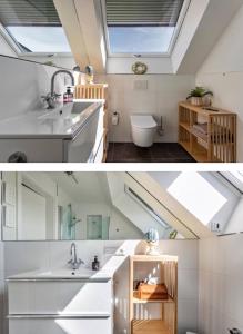 ein Badezimmer mit einem Waschbecken und ein Badezimmer mit einem Dachfenster in der Unterkunft Charmante Dachgeschosswohnung mit Balkon in Bruckmühl