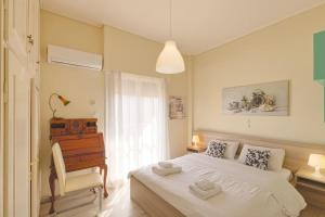 Ένα ή περισσότερα κρεβάτια σε δωμάτιο στο Marousi 4th floor