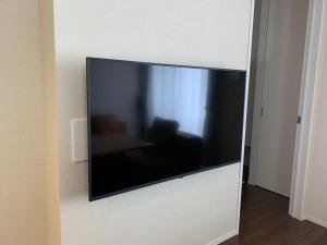 Televiisor ja/või meelelahutuskeskus majutusasutuses Maizon de Aile Room D