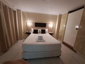Hotel Jose Ignacio Chepen客房内的一张或多张床位