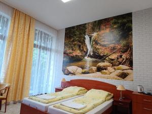 Posteľ alebo postele v izbe v ubytovaní Dom Wczasowy Magnolia