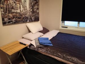 Uma cama ou camas num quarto em Casa budget