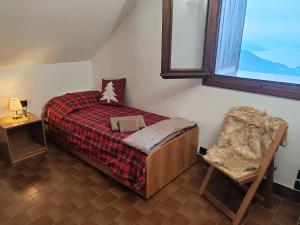 Llit o llits en una habitació de Chalet Bellagio Panorama