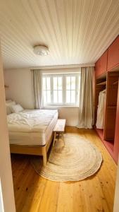 Ένα ή περισσότερα κρεβάτια σε δωμάτιο στο Ferienhaus Alexandra in Ebensee
