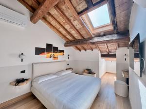 Postel nebo postele na pokoji v ubytování Rechigi Park Hotel