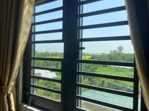 Balkón nebo terasa v ubytování Nhà Nghỉ Hoàng Khanh
