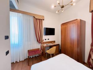 TV a/nebo společenská místnost v ubytování Rechigi Park Hotel
