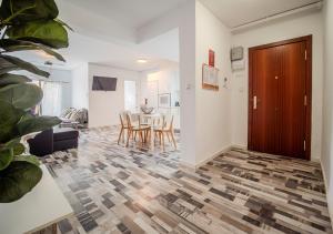 TV a/nebo společenská místnost v ubytování Aroma D’Valencia Apartment