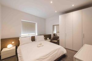 Ένα ή περισσότερα κρεβάτια σε δωμάτιο στο Good Times