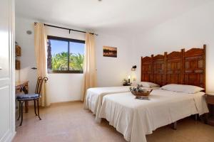Posteľ alebo postele v izbe v ubytovaní Oasis Tamarindo + 29 fotografií