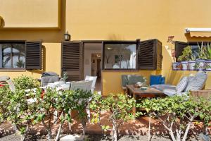 Vonkajšia záhrada v ubytovaní Oasis Tamarindo