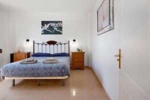 Posteľ alebo postele v izbe v ubytovaní Oasis Tamarindo