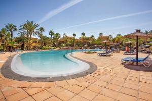 Bazén v ubytovaní Oasis Tamarindo alebo v jeho blízkosti