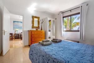 Posteľ alebo postele v izbe v ubytovaní Oasis Tamarindo