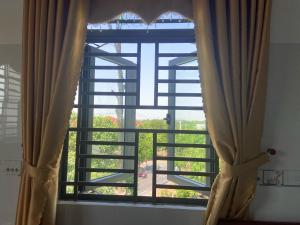 Fotografie z fotogalerie ubytování Nhà Nghỉ Hoàng Khanh v destinaci Cờ Ðỏ + 5 fotografií