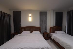 Postel nebo postele na pokoji v ubytování BK Hotel