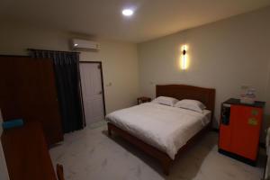 Postel nebo postele na pokoji v ubytování BK Hotel
