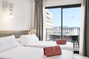 Łóżko lub łóżka w pokoju w obiekcie Stic Urban Hotel & SPA