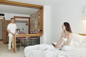 Łóżko lub łóżka w pokoju w obiekcie Stic Urban Hotel & SPA
