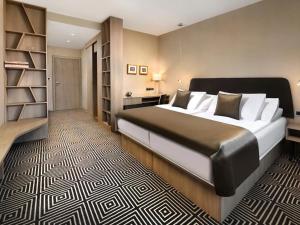 Ένα ή περισσότερα κρεβάτια σε δωμάτιο στο Hotel Lomnica
