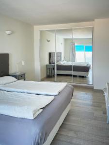Postel nebo postele na pokoji v ubytování 414 Casa Colina Mar