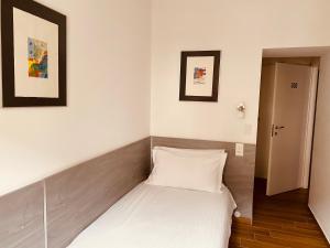 Katil atau katil-katil dalam bilik di Hotel Garni Montaldi