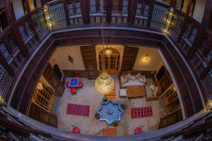 an overhead view of a living room with a christmas star at Riad Sekaya Fez in Fès