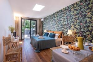 Postel nebo postele na pokoji v ubytování B&B Lu Cuccuviu