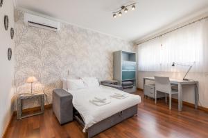 Ένα ή περισσότερα κρεβάτια σε δωμάτιο στο Viravento - Family House