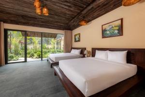 Katil atau katil-katil dalam bilik di Scenic Mountain Ecolodge Ninh Binh