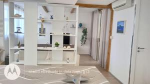 TV a/nebo společenská místnost v ubytování GM&V casa vacanze