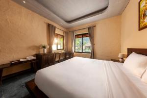 Katil atau katil-katil dalam bilik di Scenic Mountain Ecolodge Ninh Binh