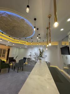 TV a/nebo společenská místnost v ubytování Mi Hotel Boutique