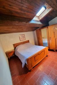 Ένα ή περισσότερα κρεβάτια σε δωμάτιο στο Grande maison de vacances chez Jo et Maria +12 φωτογραφίες