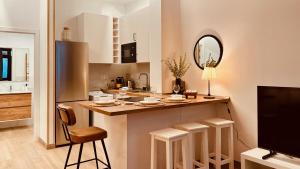 Kuchyň nebo kuchyňský kout v ubytování Click&Guest - Modern and Luxury Flat B in Telde + 29 fotografií