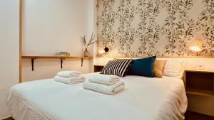 Postel nebo postele na pokoji v ubytování Click&Guest - Modern and Luxury Flat B in Telde