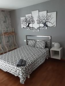 A bed or beds in a room at O IGREXARIO Még 25 kép