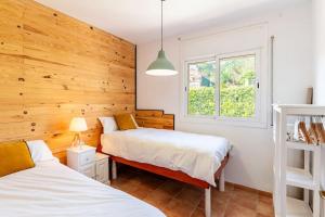 En eller flere senge i et værelse på Villa Paraíso + 35 billeder