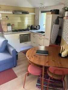 Photo de la galerie de l'établissement B en B Op Steendam, Tuinkamer onder de appelboom, à Steendam