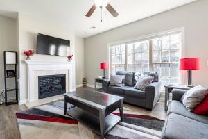 a living room with two couches and a fireplace at TWO-STORY Townhouse Kentucky Horse Park at Kittens Joy in Lexington